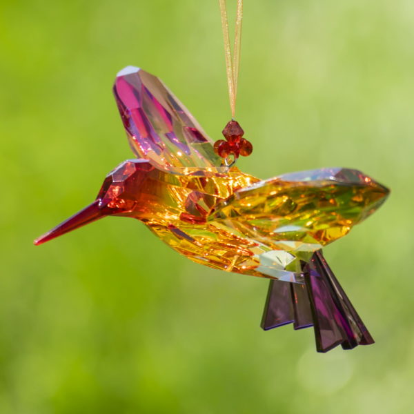 Reddish- Pink and Orange Acrylic Hummin Bird hanging from Orange String