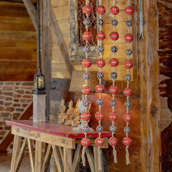 full size image of 4 74 inch long garland with porcelain sailor balls and rope in red, light blue and black colors