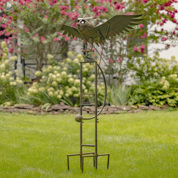 Large iron rocking owl with solar eyes and moving wings garden stake