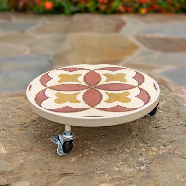 Flate round plant trolley with beige base and red and yellow mosaic design on the top