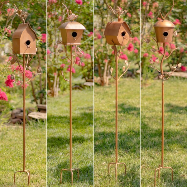 Four antique copper iron birdhouse stakes with a sloped roof, a square roof, a frame roof, and a dome roof