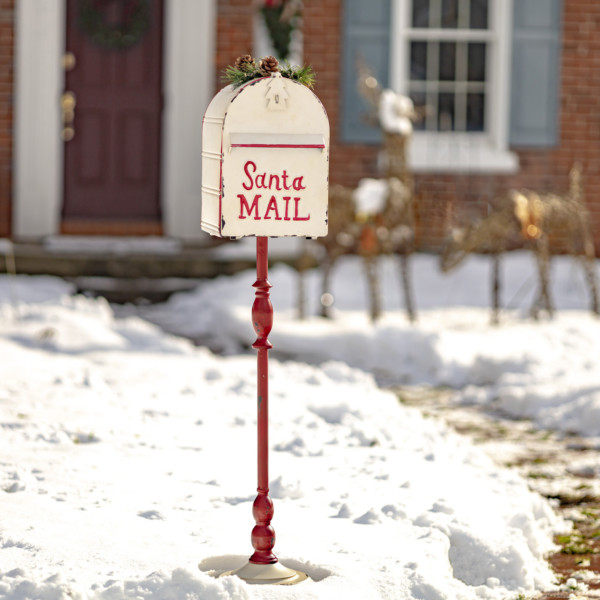 Standing tall white Santa Mailbox with with Light-up Wreath at the top of it