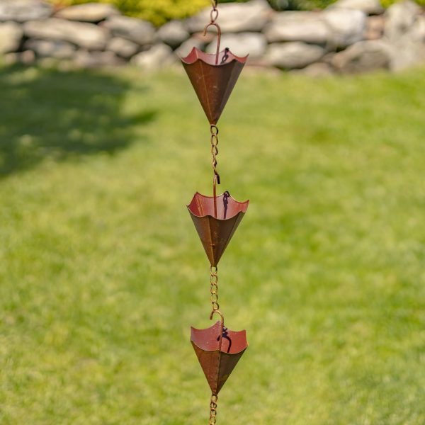 closed-up image of iron upside down umbrella rain chain in distressed antique rust finish