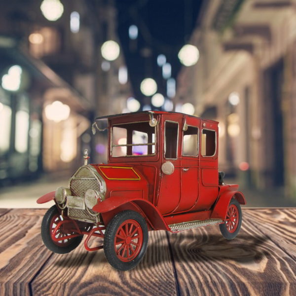 Antique Red Automobile - wth mirrors and head lights and black wheels