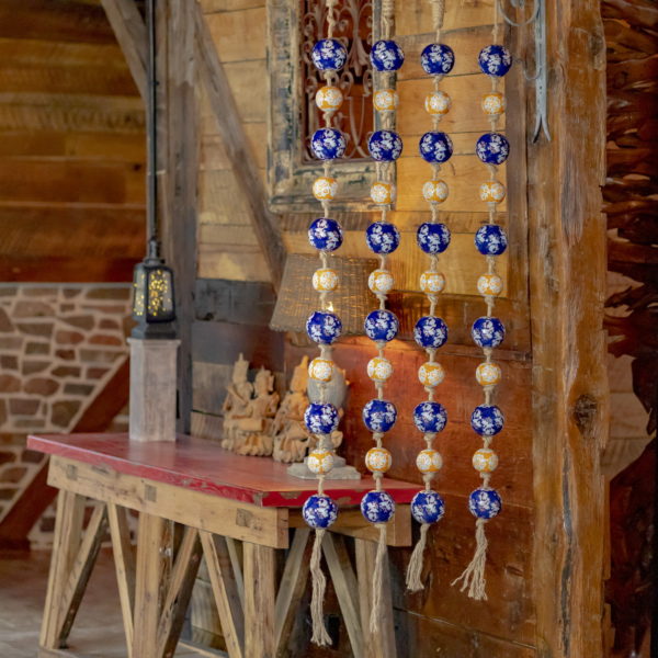 full length image of 4 74 inch long hanging garlands with ceramic sailor balls and rope in blue and orange colors