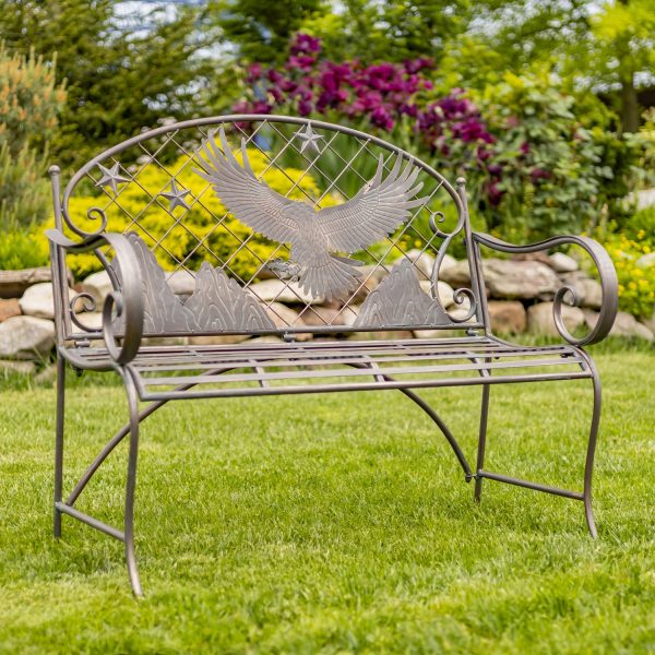 classic garden iron bench with round top backrest with flying eagle and mountain silhouette in distressed antique bronze finish