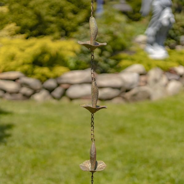 closed up image of 3 iron upside down mushrooms rain chain in distressed antique copper finish