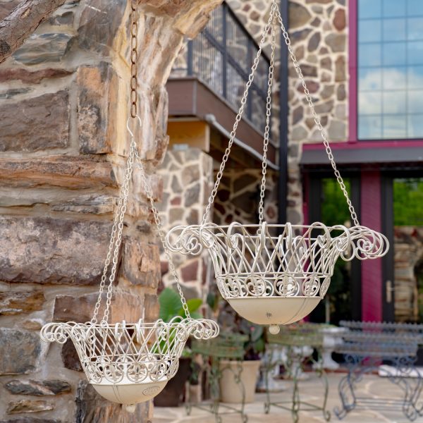 Two hanging planters in antique white with iron detailed style