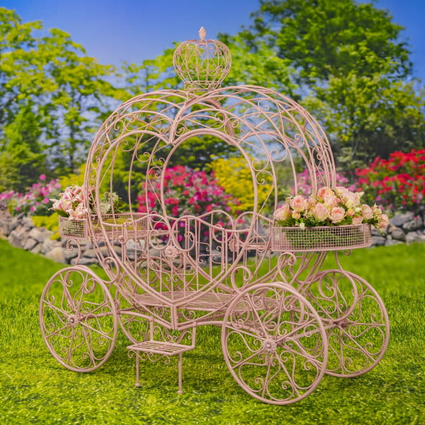 side view of heart-shaped iron flower in pink and gold finish with crown on top of it