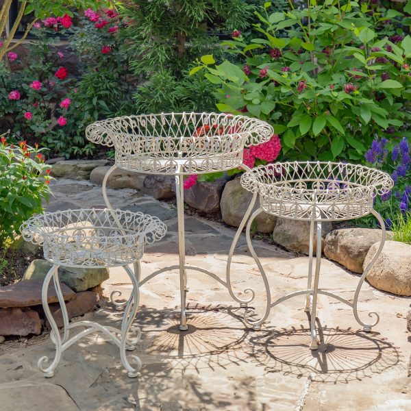 3 iron plant stands in antique white in 3 different sizes with basket shaped top