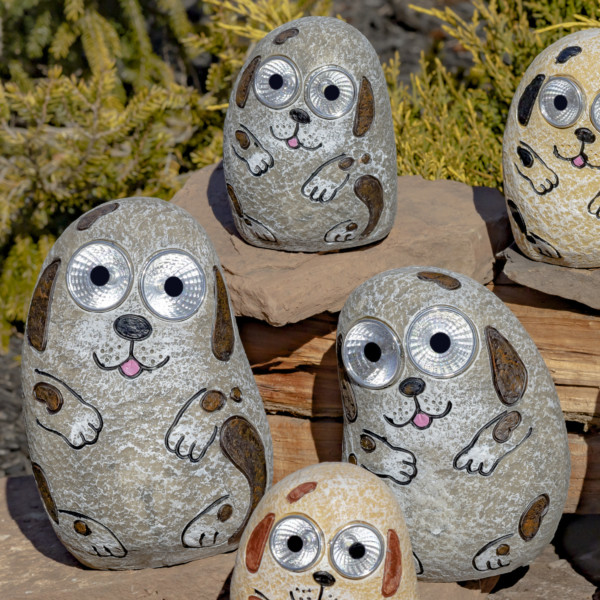 One set of the grey Solar Rock Dogs sitting on some rocks