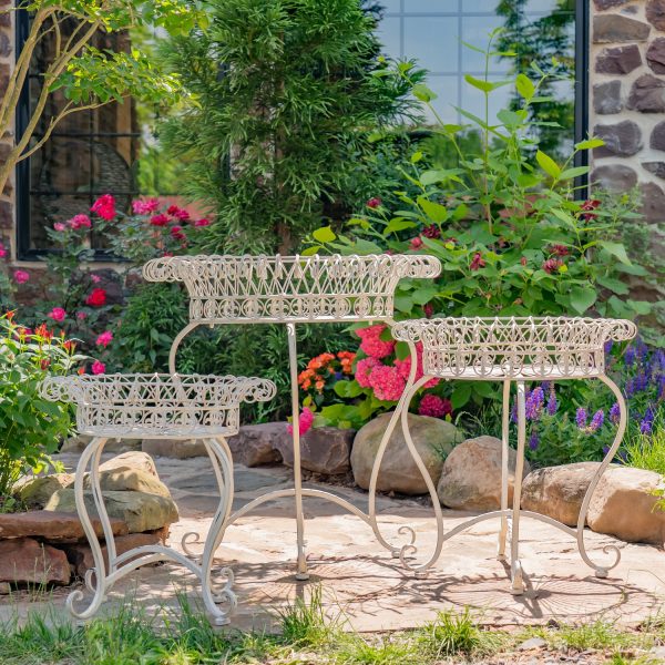 3 iron plant stands in antique white in 3 different sizes with basket shaped top