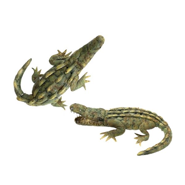 Metal alligators decoration with realistic texture and color against a white background