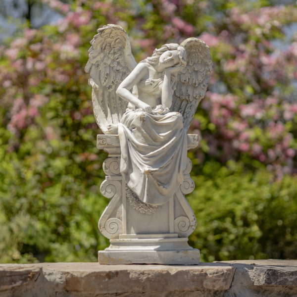 31 inch tall magnesium angel statue sitting on pillar in antique white finish