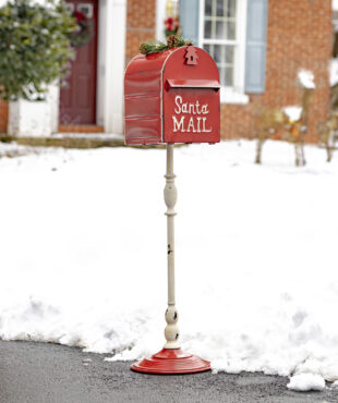 Standing tall red Santa Mailbox with with Light-up Wreath at the top of it