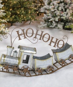left side of 36 inch long galvanized Christmas train with words HO HO HO flow out the chimney