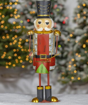 Galvanized metal Christmas nutcracker figurine with drum