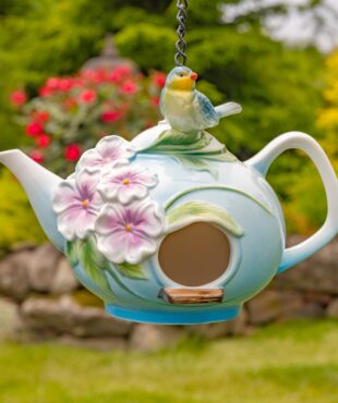 Crafted with exceptional quality, these unique birdhouses showcase intricate hand-painted designs and beautifully textured porcelain