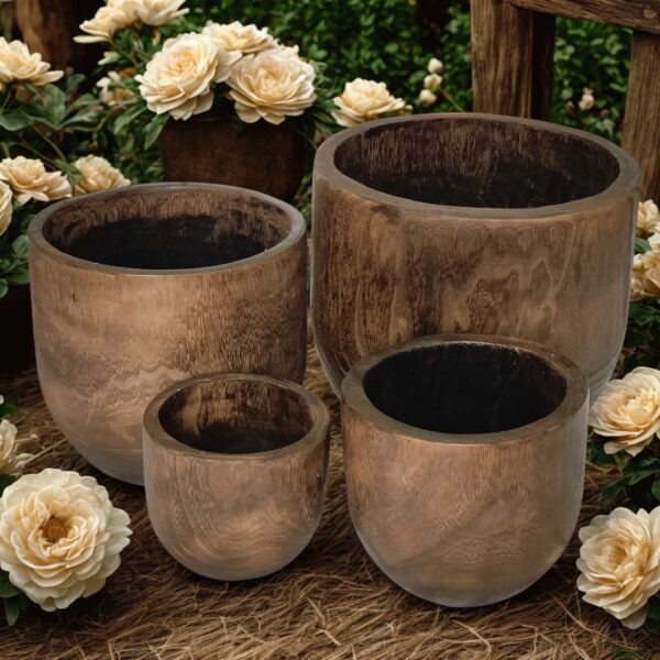 image of four wooden planters with a rustic background
