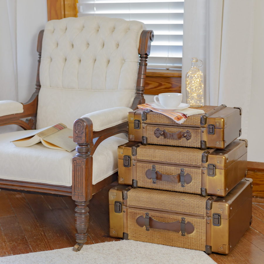 Three Bamboo Storgae Trunks Being Used As a Side Table