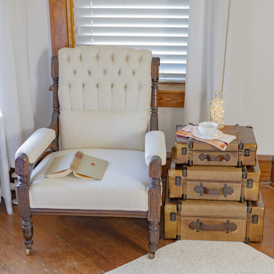 Three Bamboo Storgae Trunks Being Used As a Side Table to Put Beverages on