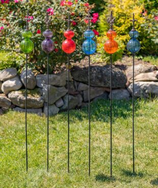 Set of 6 handblown glass ball iron stakes with fleur de lis finial in 6 colors red, cobalt blue, orange, green, purple and greyish blue