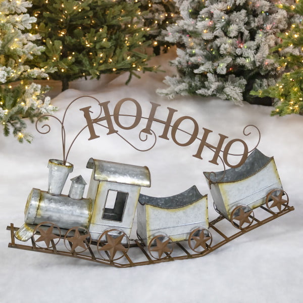 left side of 36 inch long galvanized Christmas train with words HO HO HO flow out the chimney