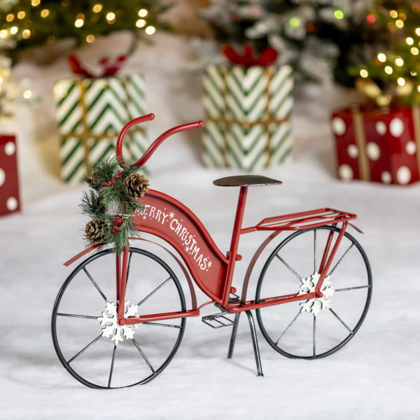 small red merry Christmas bicycle with wreath