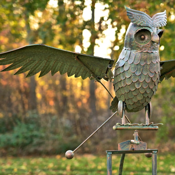 closeup of Wesley the Owl 81 inch tall large iron rocking stake with flapping wings and distressed antique bronze finish