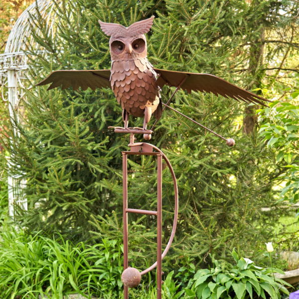 top half of Wesley the Owl 81 inch tall metal rocking garden stake with flapping wings in a hand painted distressed rust finish
