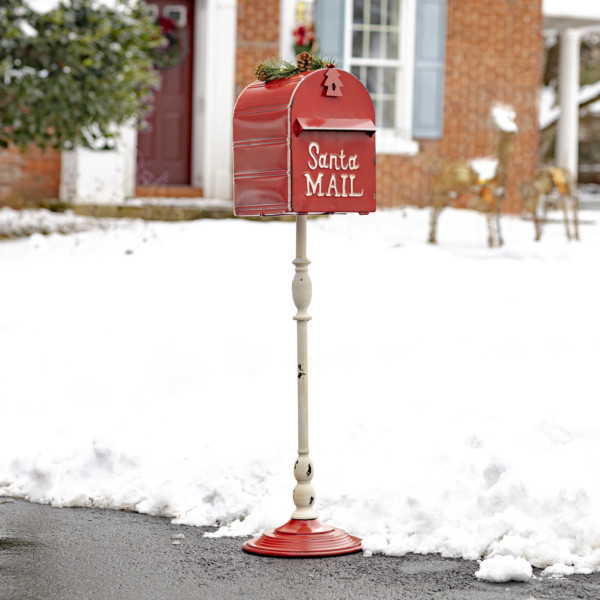 Standing tall red Santa Mailbox with with Light-up Wreath at the top of it