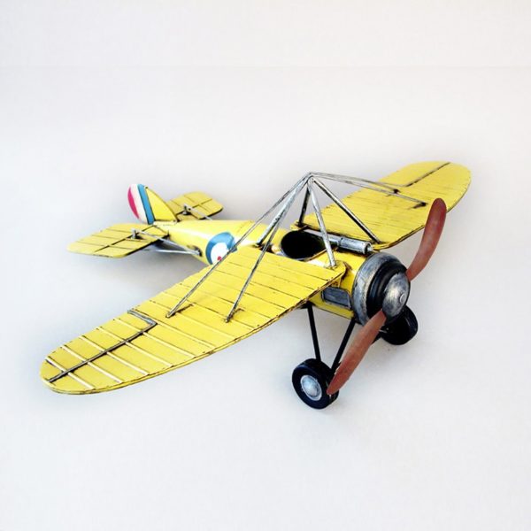WWII Inspired Metal Model Airplane in Pale Yellow