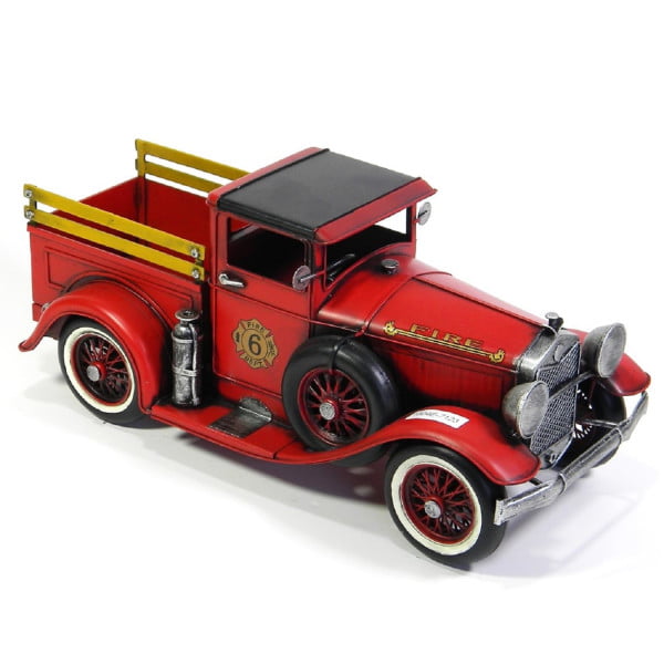 Metal red fire truck with spare tire on the side tabletop decor