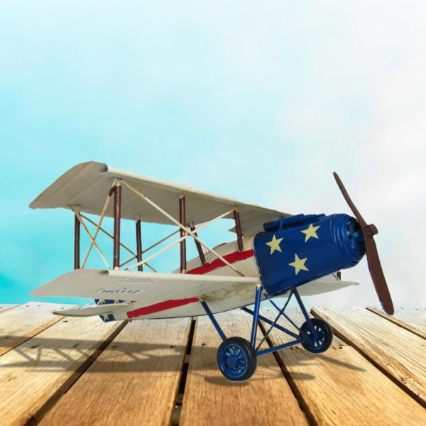 small metal tabletop airplane model painted in American flag