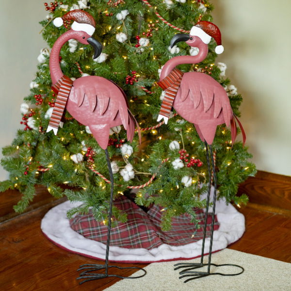 A Pair of Iron Christmas Flamingos - One neck is curled then other is looking away from the other bird- Both have Scarves
