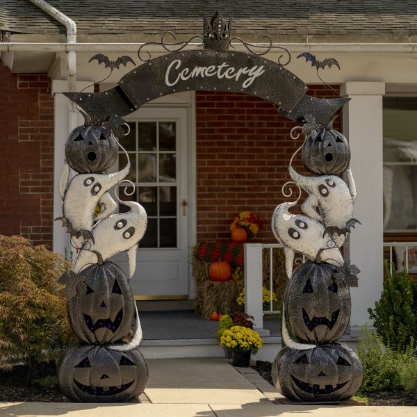 9.5 feet tall large iron Halloween Cemetery arch with purple LED lights in black pumpkins and white ghosts in front of home entrance