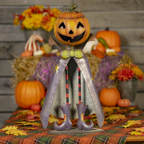 27 inch tall iron pumpkin bobble head with a lid in purple coat and boots