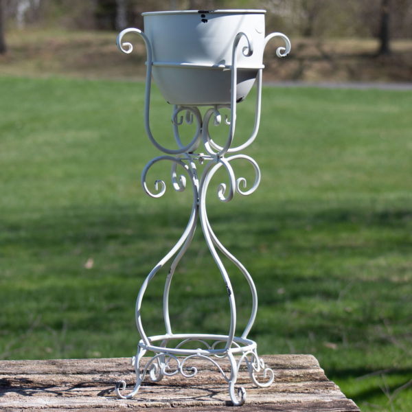 full length image of 31 inch tall iron flower pot and curved stand in antique white distressed finish