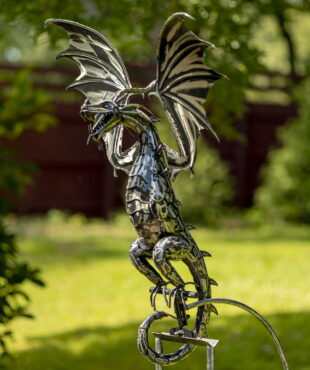 Iron dragon swing stake with large open wings, wide open mouth and curled downward tail in silver-black metallic finish