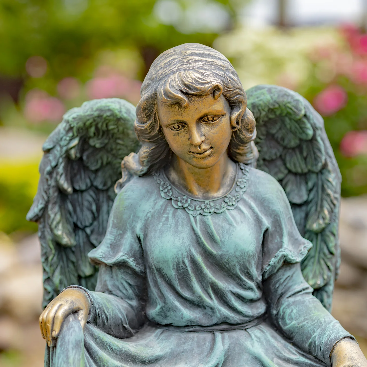 Close Up of Bronze Angel Staring Down
