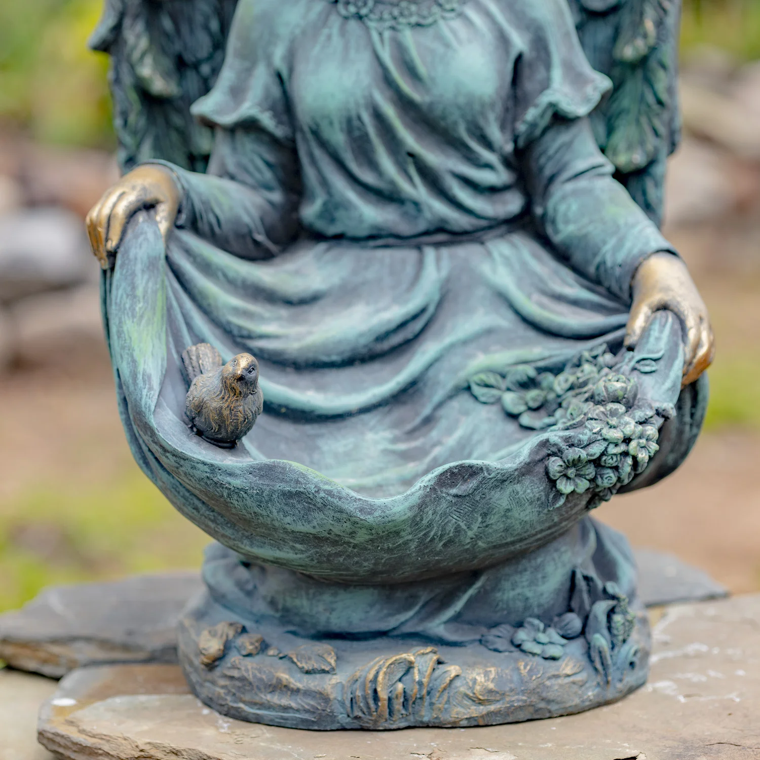 View of Bird Sitting In Angels Lap