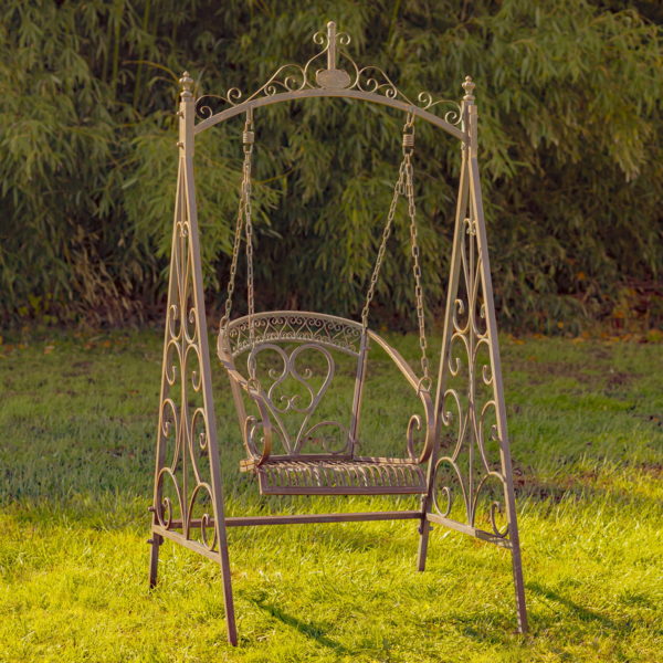 Full View of Iron Swing Chair with Scrolled and Heart- Shaped Details