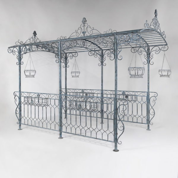 13 feet long iron gazebo with hanging planters in distressed light blue finish
