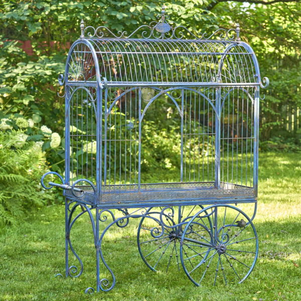 Large iron flower cart with curved roof real rotating wheels and handle painted in antique blue finish