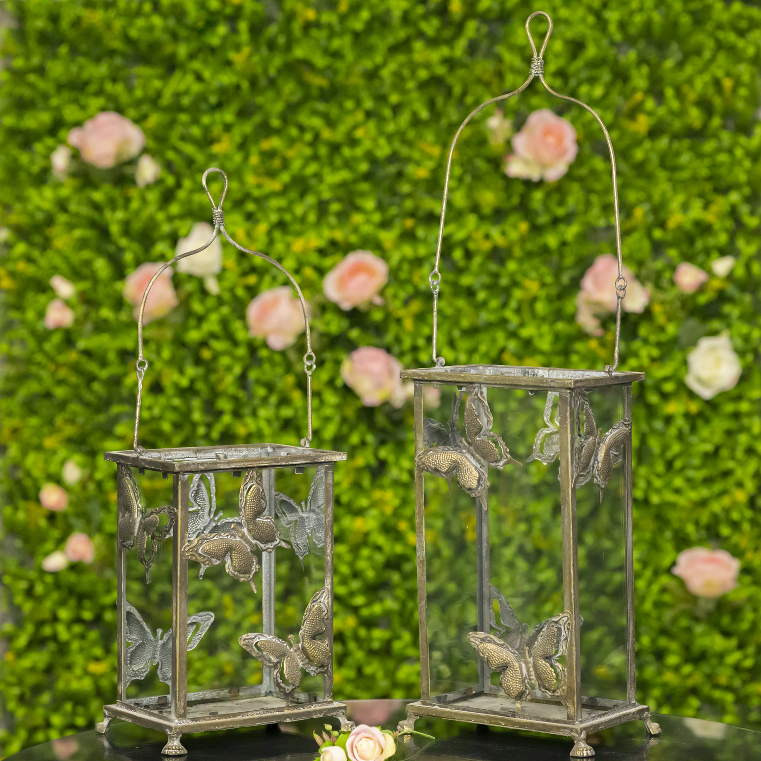 One small and one large frosted gold lantern with butterfly design