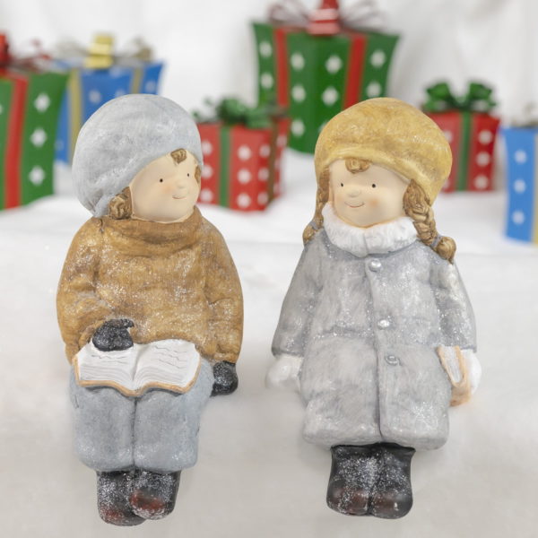 Boy and Girl Statue- One with Grey Hat the Other with a Yellow Hat - one with Hair Braided and the other holding a book