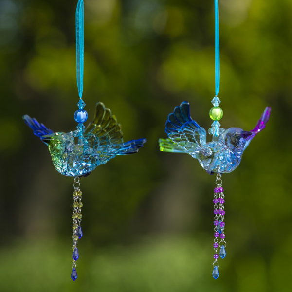 image of 2 short acrylic blue jay ornaments with beaded tassel in 2 assorted five tone colors