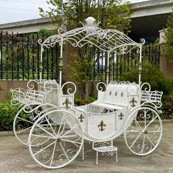 side view image of large Parisian style iron Carriage with planters in white finish