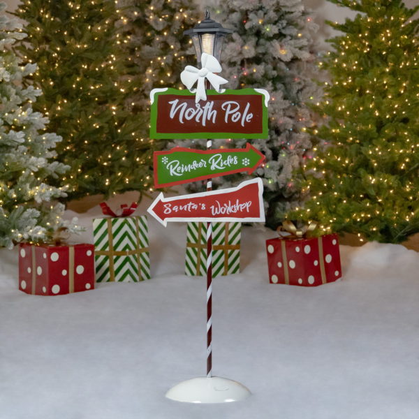 North Pole Direction sign with solar lantern