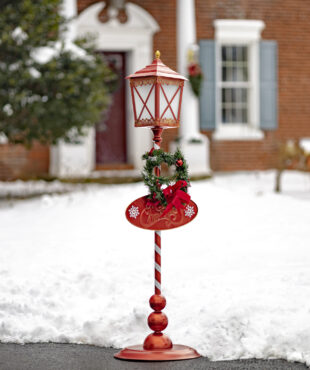 red standing Christmas lantern with round base